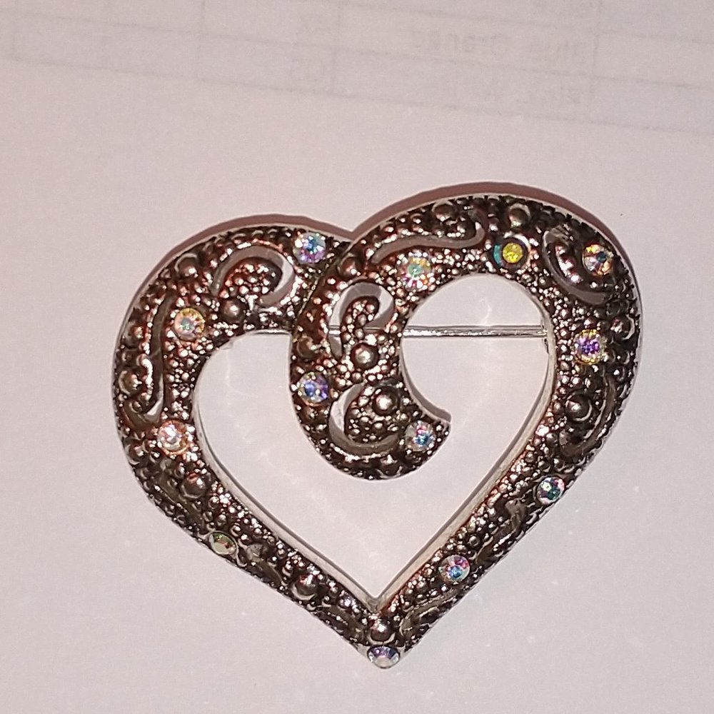 Heart-shaped brooch with rhinestones